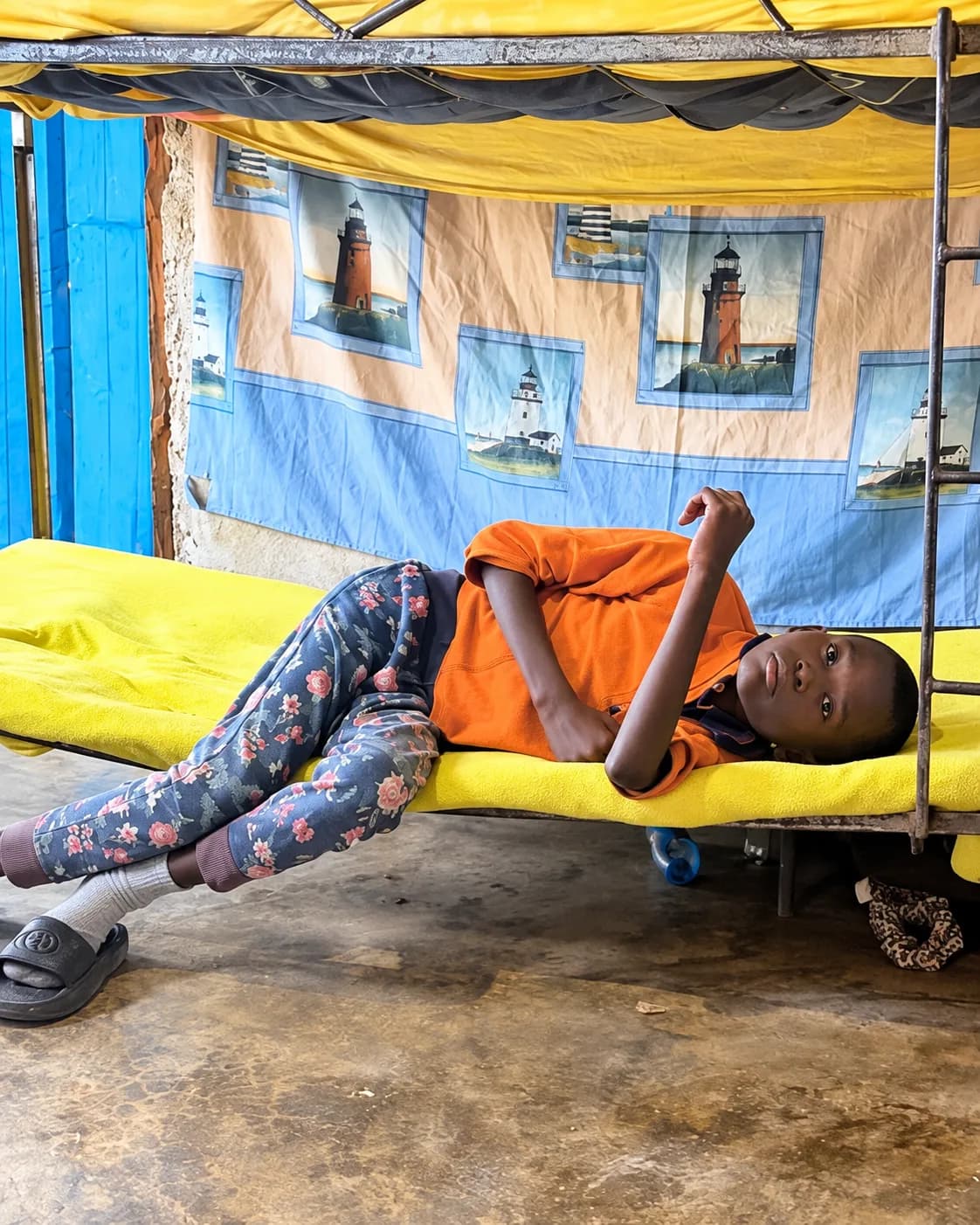 Children gathered around a table at the Church Quake children's home in Haiti